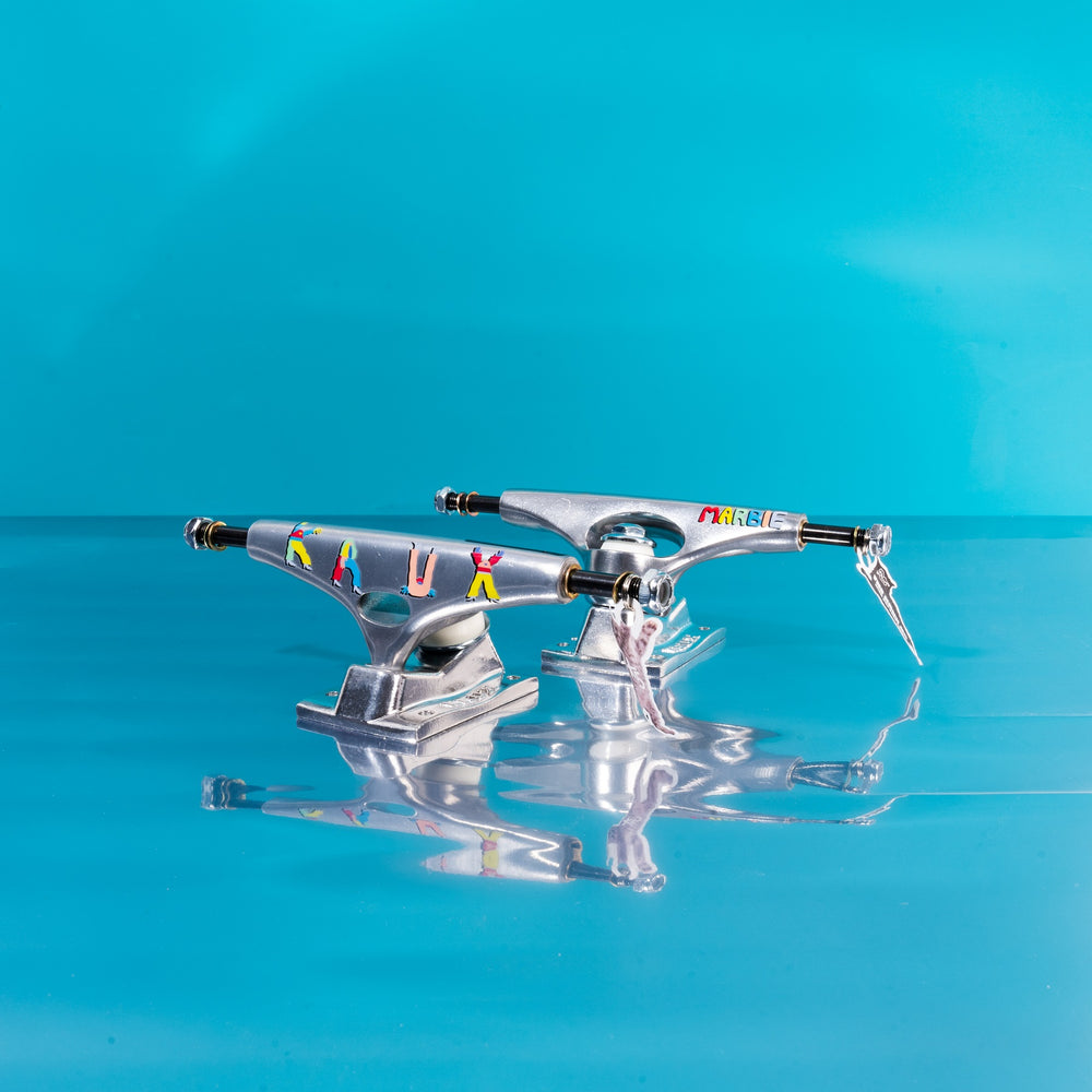 33132566_141666_72279_k5_pro_marbie_letters_dlk_standard_skateboard_trucks_krux_size_825_850 
